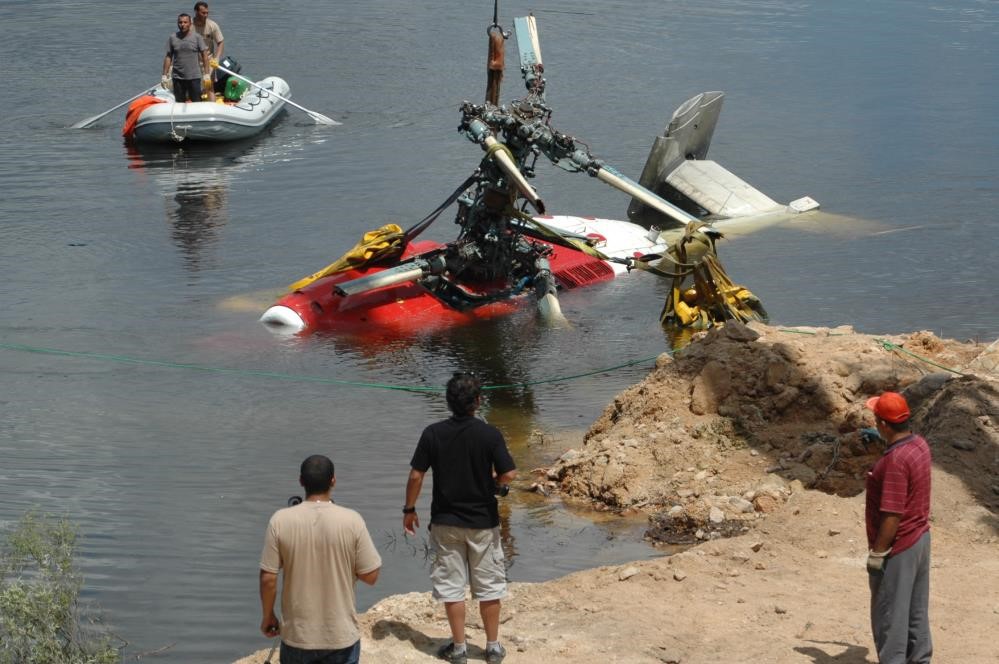 Waters Recede, Crash Remnants Revealed