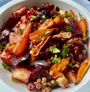 Baked beetroots, celeriac, carrots and green lentils with pomegranate molasses