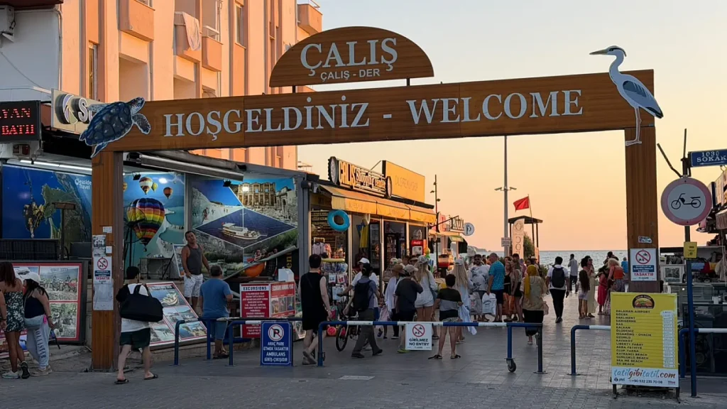 Evening bustle at Çalış Beach as locals seek relief from the heat